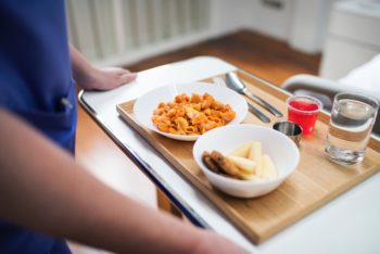 hospital food being served to a patient