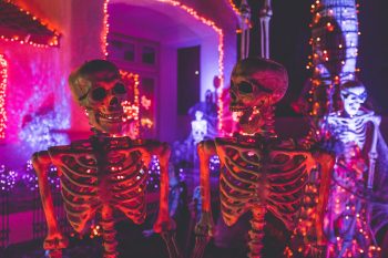 two skeleton decorations on halloween